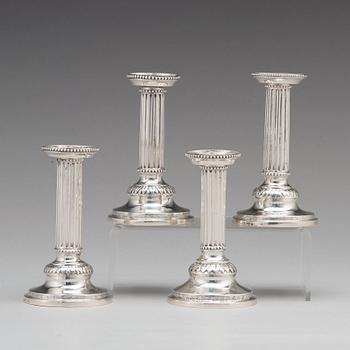 A matched set of four Gustavian silver candlesticks,