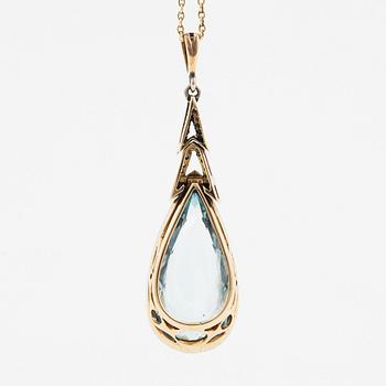 A 14K gold and platinum pendant set with an aquamarine and rose-cut diamonds.