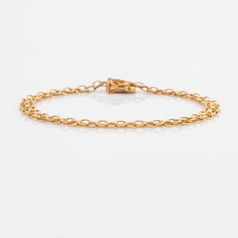 18K gold bracelet.