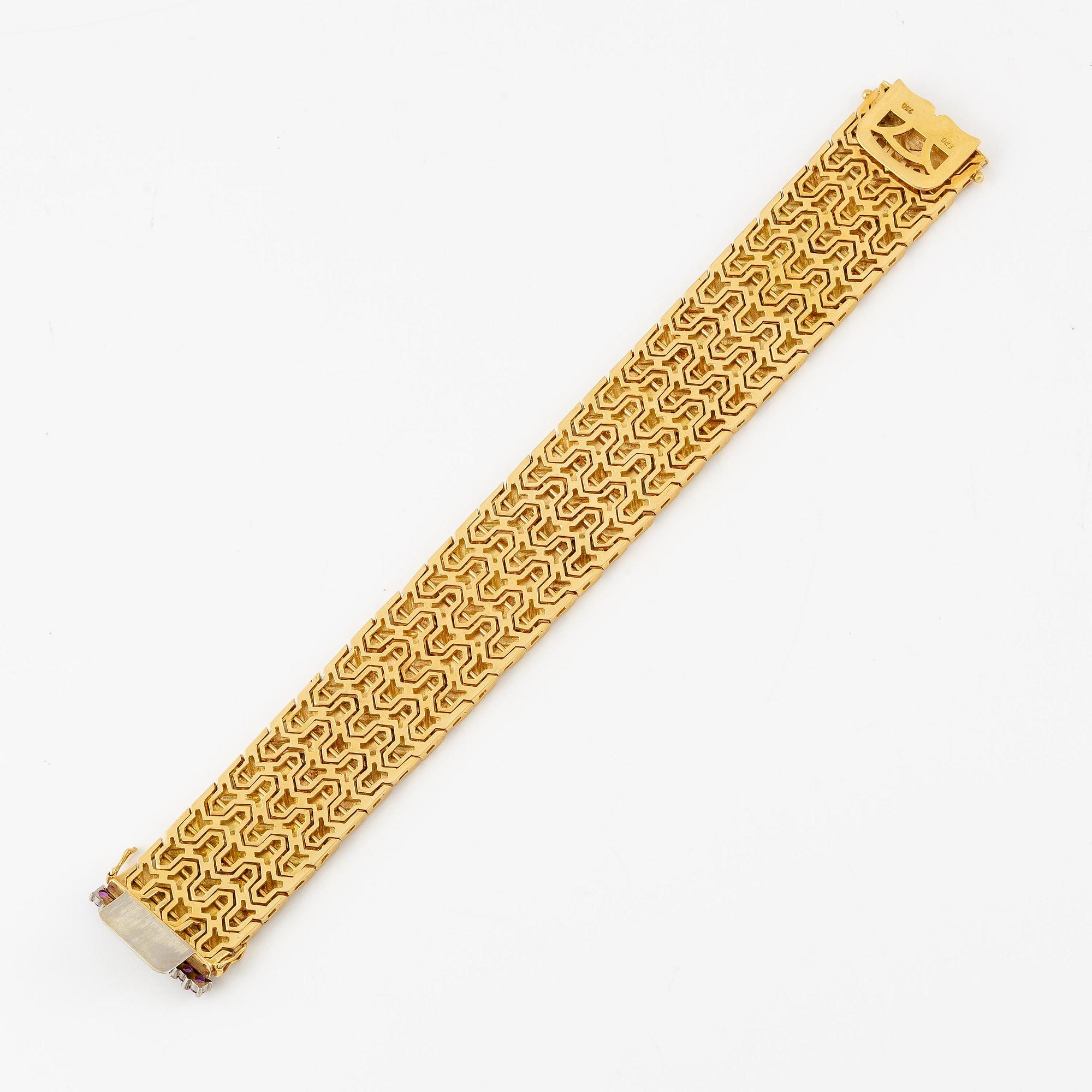 A bracelet in 18K gold with eight-cut diamonds and pink stones.