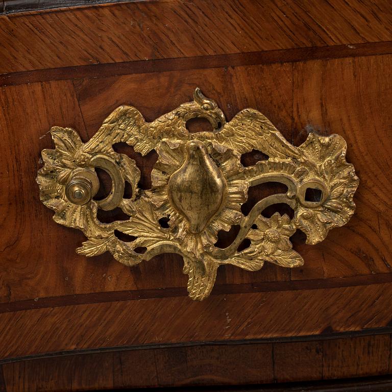a mid 1700's rococo chest of drawers.