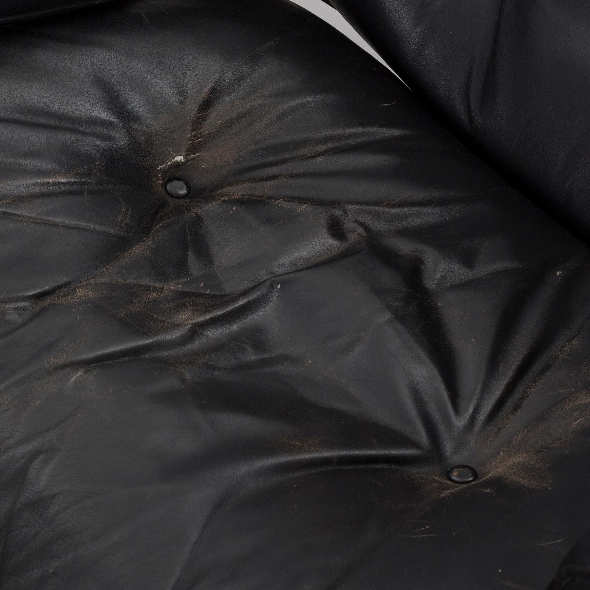 A armchair and footstool, "Lounge Chair", Charles & Ray Eames, USA, Herman Miller, 1970s,