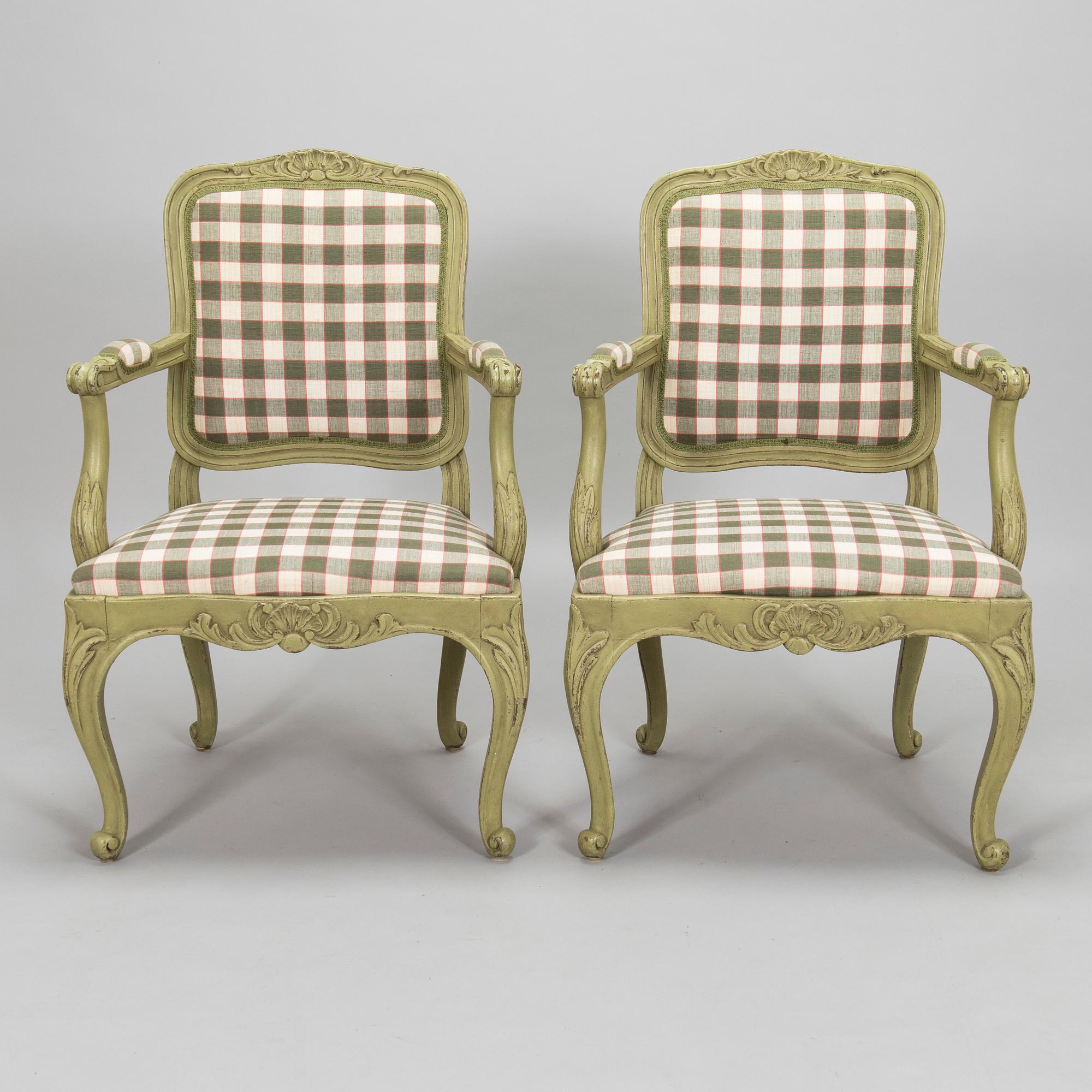 A pair of 20th century  Rococo style armchairs.