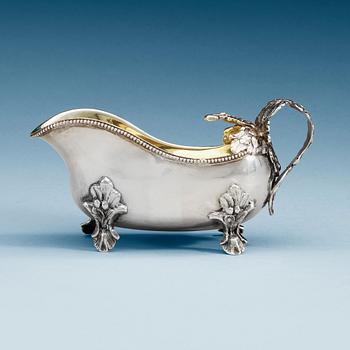 991. A Swedish 18th century parcel-gilt cream-jug, makers mark of Anders Schotte, Uddevalla 1793.