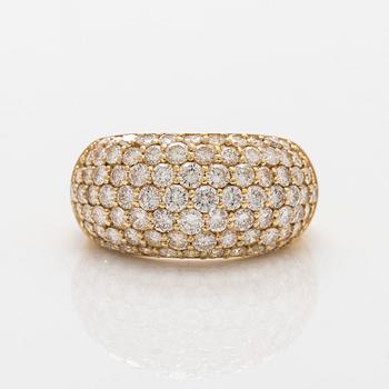 Sormus, 18K kultaa ja briljanttihiottuja timantteja.