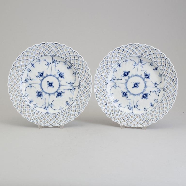 A pair of 'Musselmalet' porcelin plates, ROyal Copenhagen, Denmark, mid 20th century.