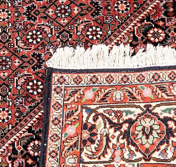 An old Bidjar carpet approx 240x174 cm.