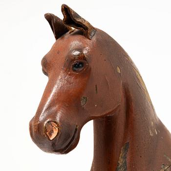 A toy horse, early 20th century.