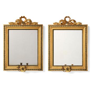 427. A pair of two-branch giltwood girandole mirrors attributed to P. Ljung (1743-1819).