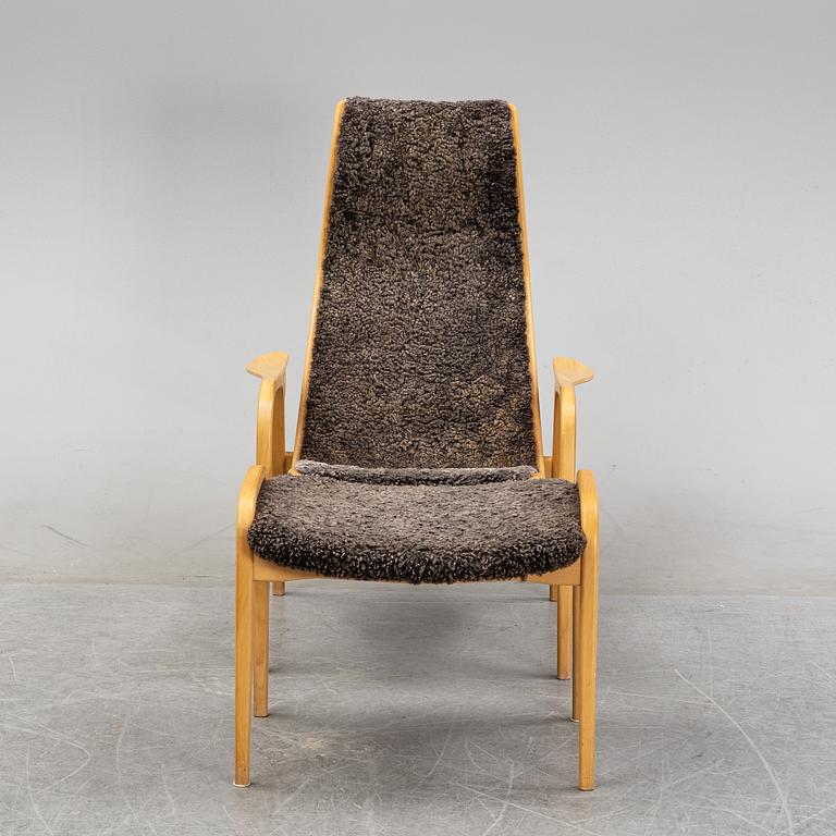 A 'Lamino' easy chair and stool by Yngve Ekström for Swedese, designed 1957.