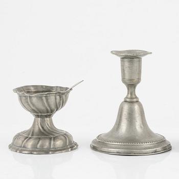 A group of three pewter candlesticks, a salt cellar and four dishes, including Erik Wikgren, Nyköping, (1805-1846).