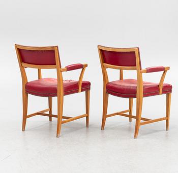 Josef Frank, a pair of mahogany and red leather model 695 armchairs, Svenskt Tenn, Sweden.