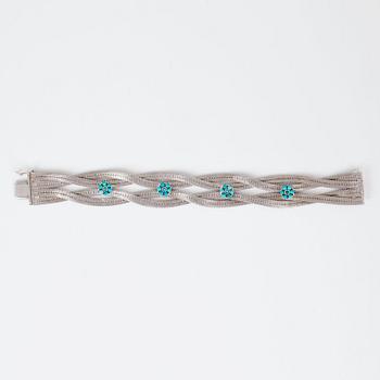 A turquoise and white gold bracelet.
