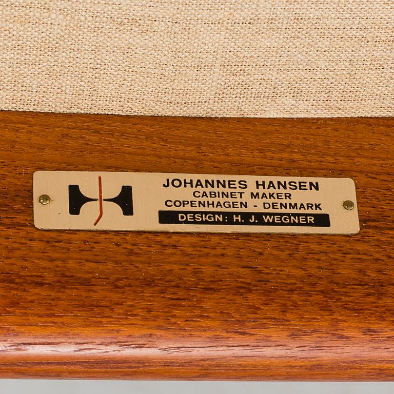 A Hans J Wegner teak and leather "JH 513" chair from Johannes Hansen, Denmark.