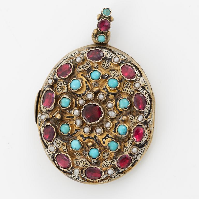 Medallion with enamel details, pearls, turquoises, and pink stones.
