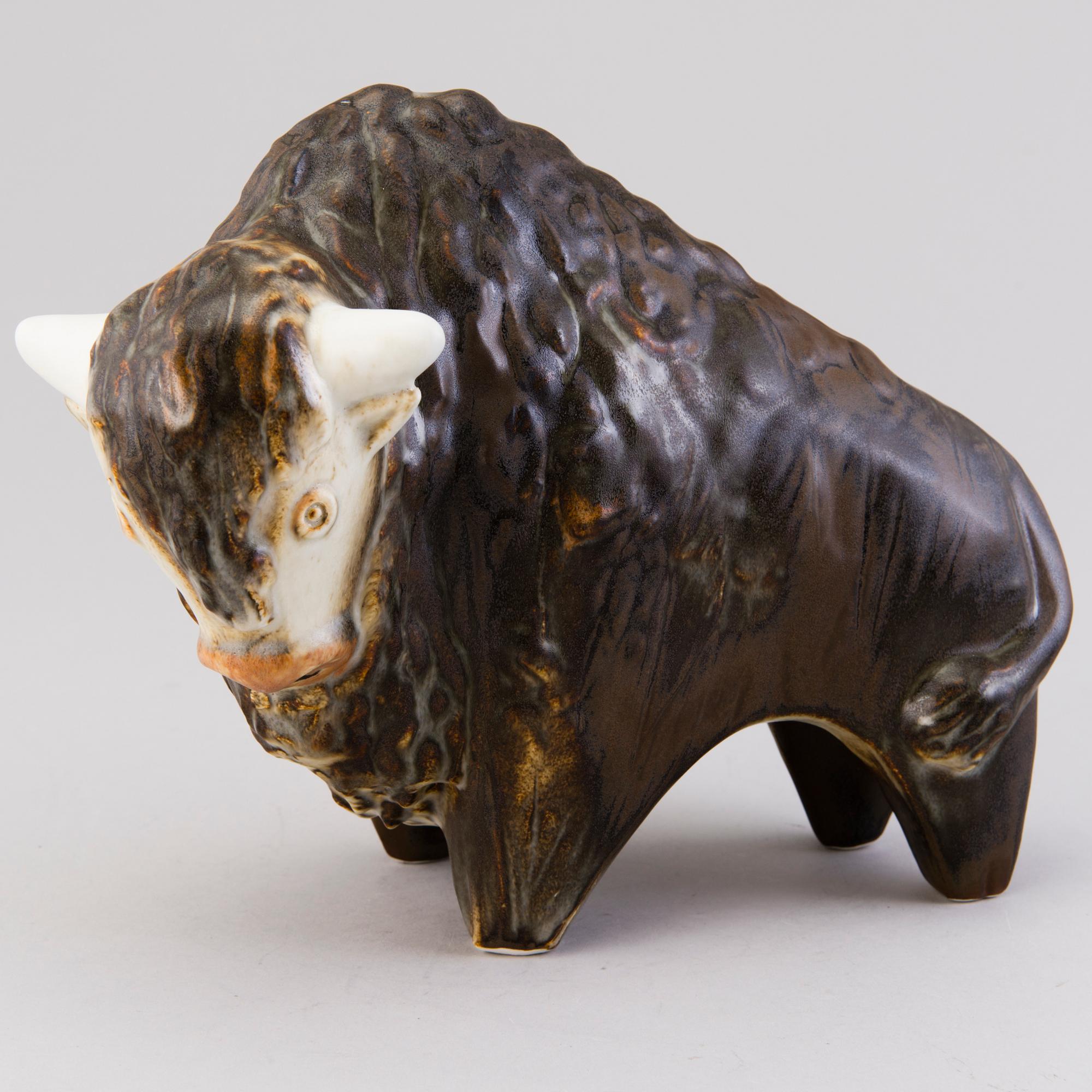 A Ceramic Figurine, signed T Kaasinen Arabia Finland.