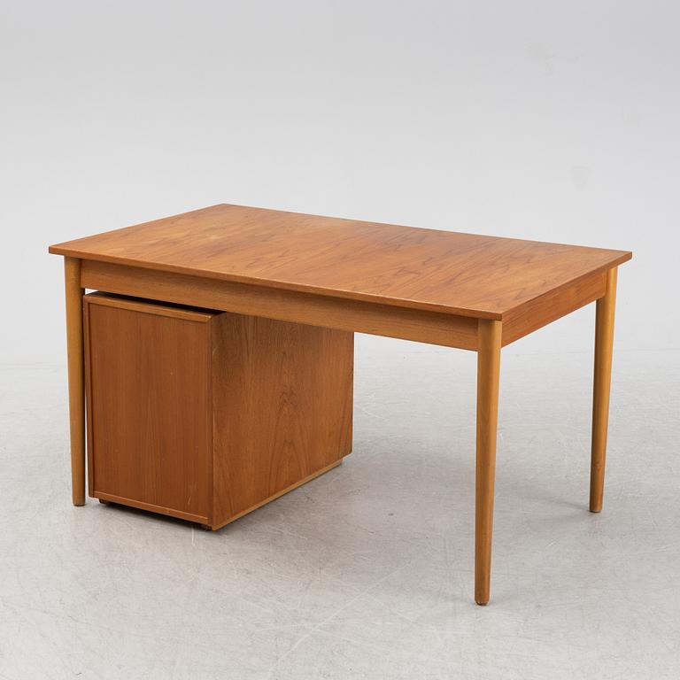 A desk with a drawer unit, Bra Bohag, Hugo Troeds, Bjärnu, mid 20th Century.