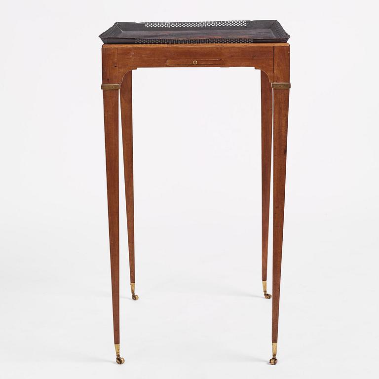 A late Gustavian tôle-peinte and mahogany tray-table from the workshop of Georg Haupt, Stockholm, late 18th century.