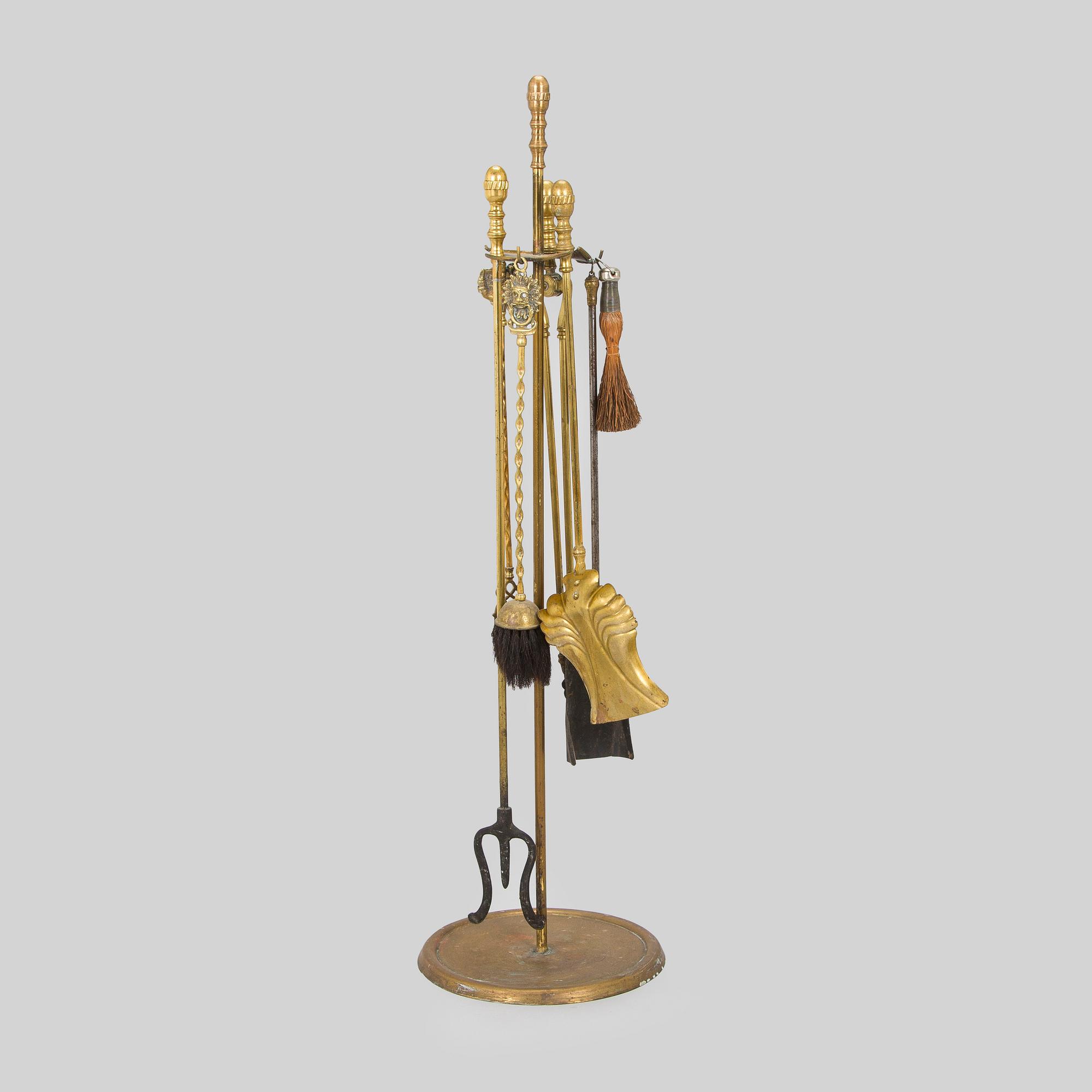 A brass fire set, 20th century.