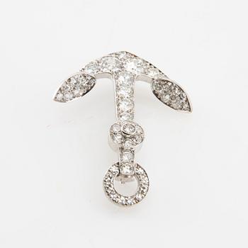 Brooch in the form of an anchor made of 18K white gold with diamonds.