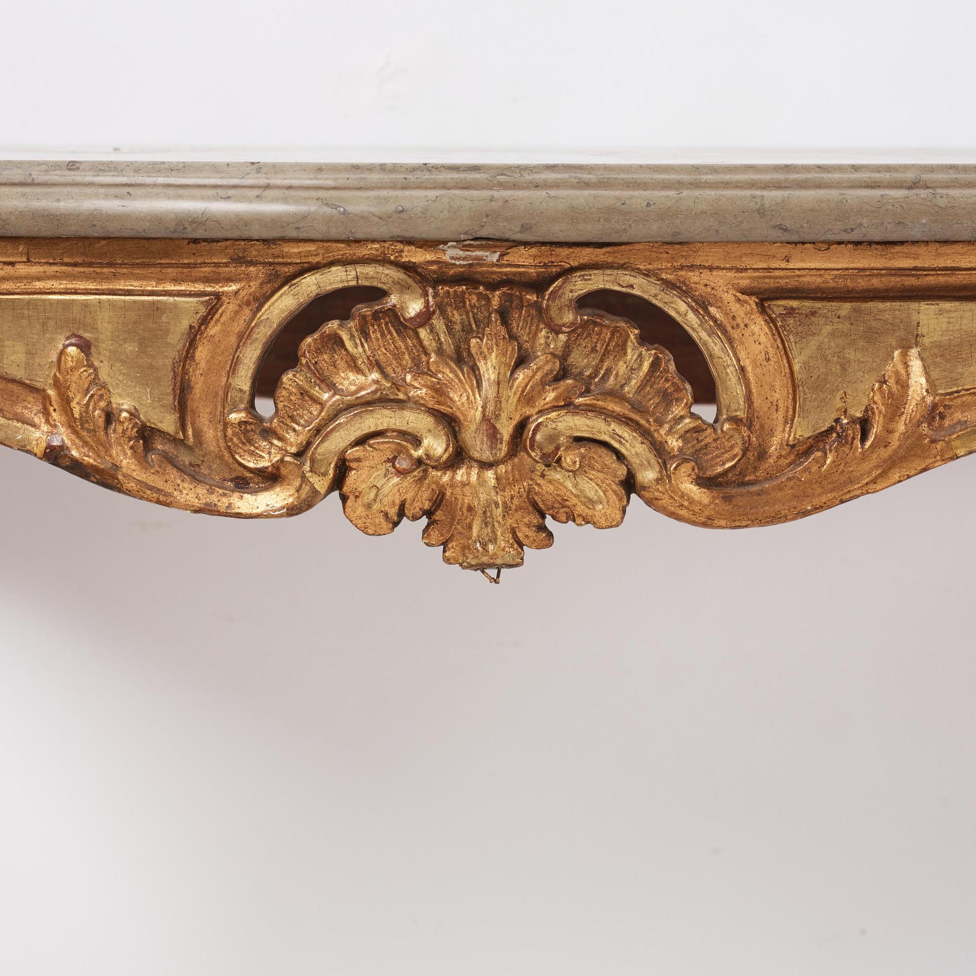 A Swedish giltwood and limestone console table, Stockholm, later part 18th century.