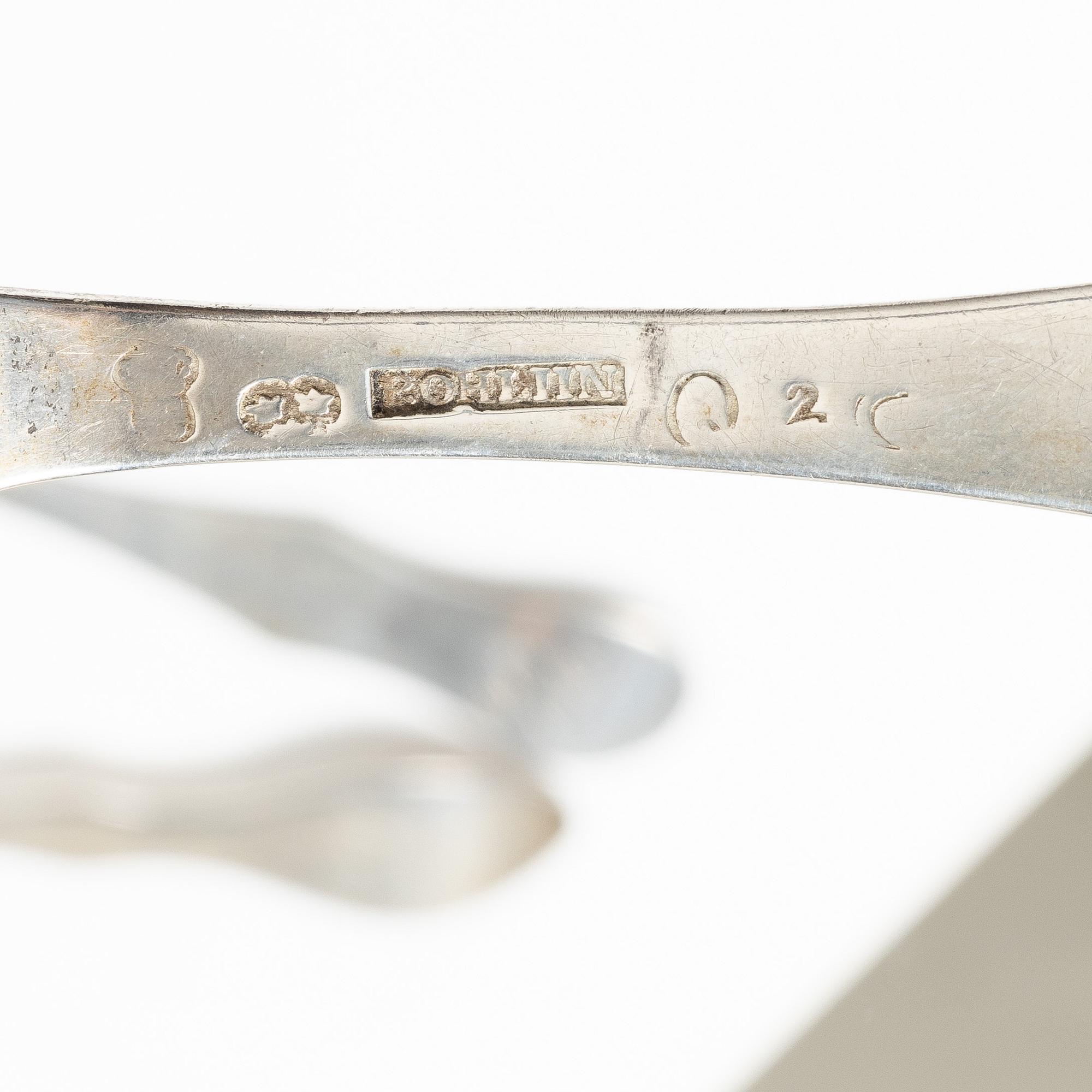 Three Swedish silver tablespoons with fiddle-pattern handles, circa 1800.