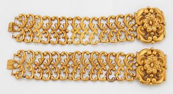 A pair of 19th century 18K gold bracelets.