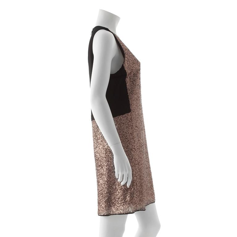 SAND red carpet, a sequin embellished dress.