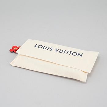 LOUIS VUITTON, a "Clémence" wallet.