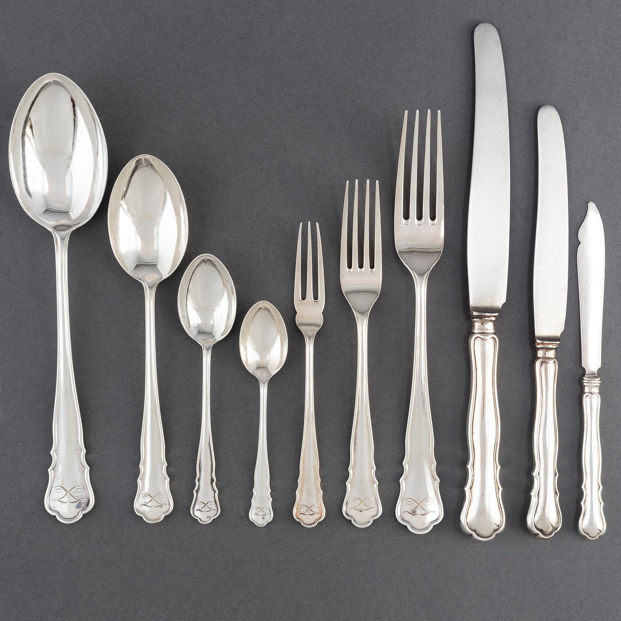 A Swedish 263 piece silver table-cutlery, marked NK, Stockholm 1917.