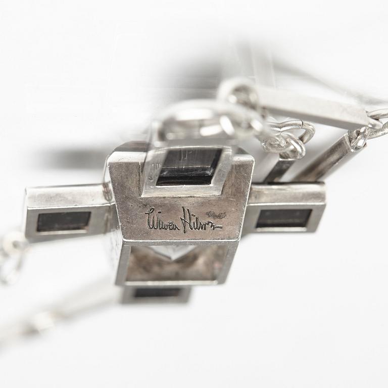 Wiwen Nilsson, a crucifix pendant and chain, sterling silver with facet cut rock crystal and onyx, Lund, Sweden 1935.