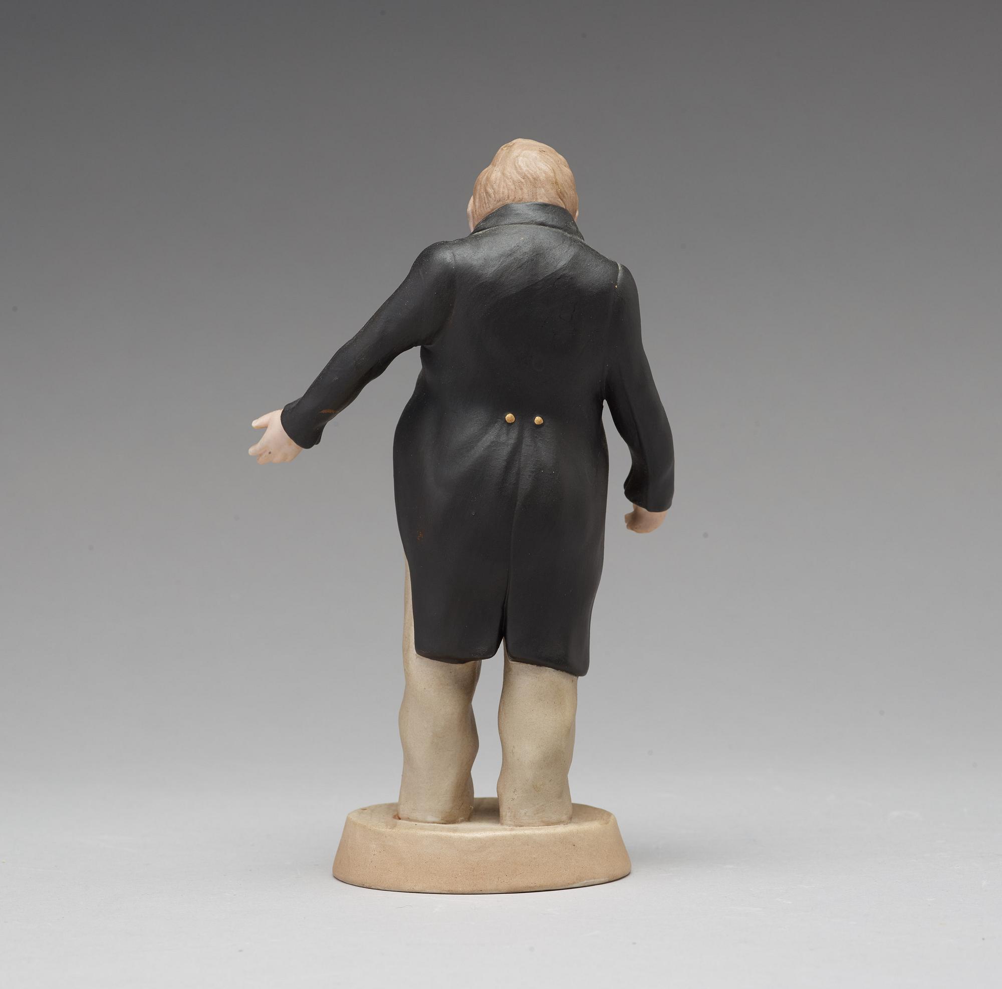 A bisquit porcelain figure of Sobakevich from Gogol's 'Dead Souls', Gardner, Moscow, 1880-1917.