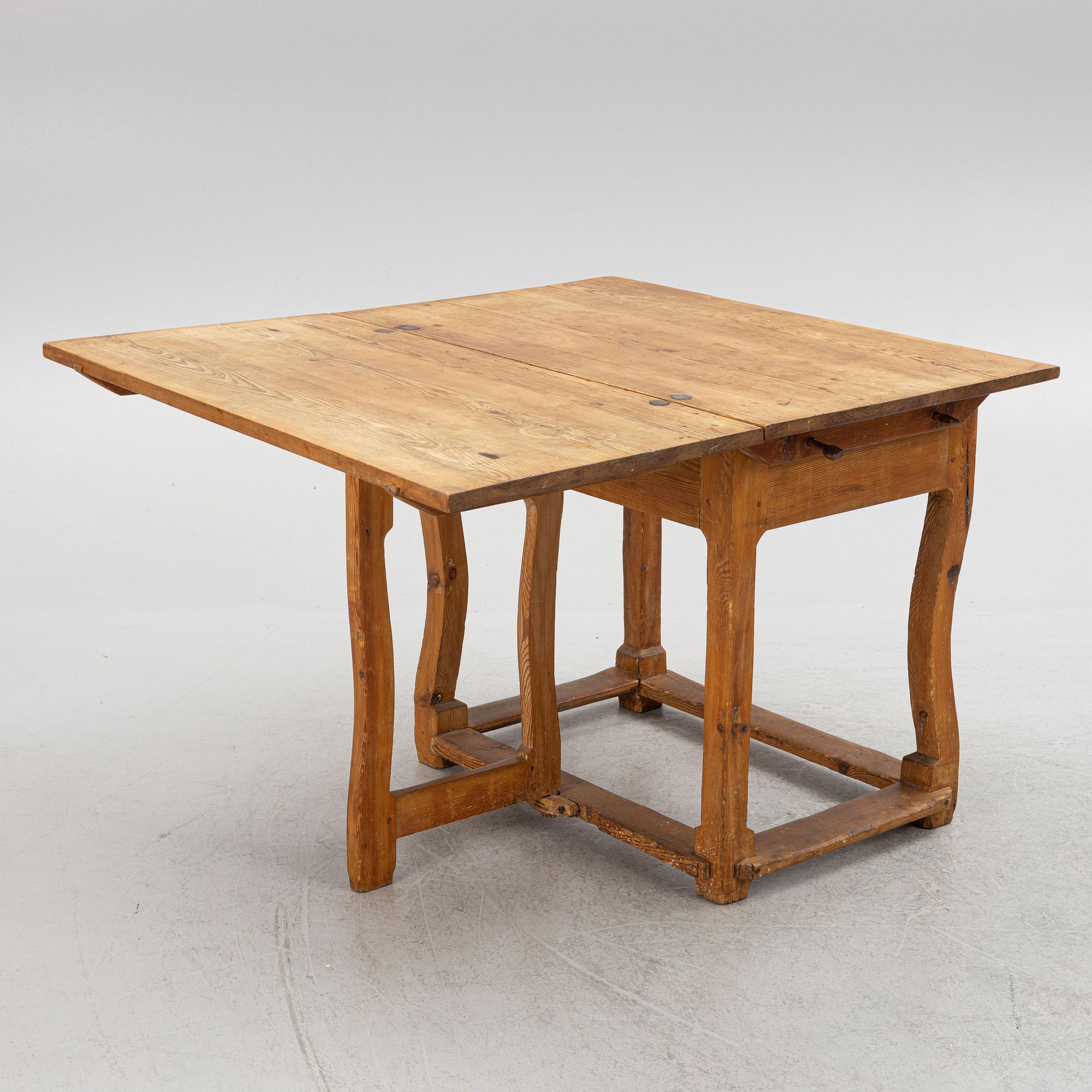 A 18th century gate-leg table.