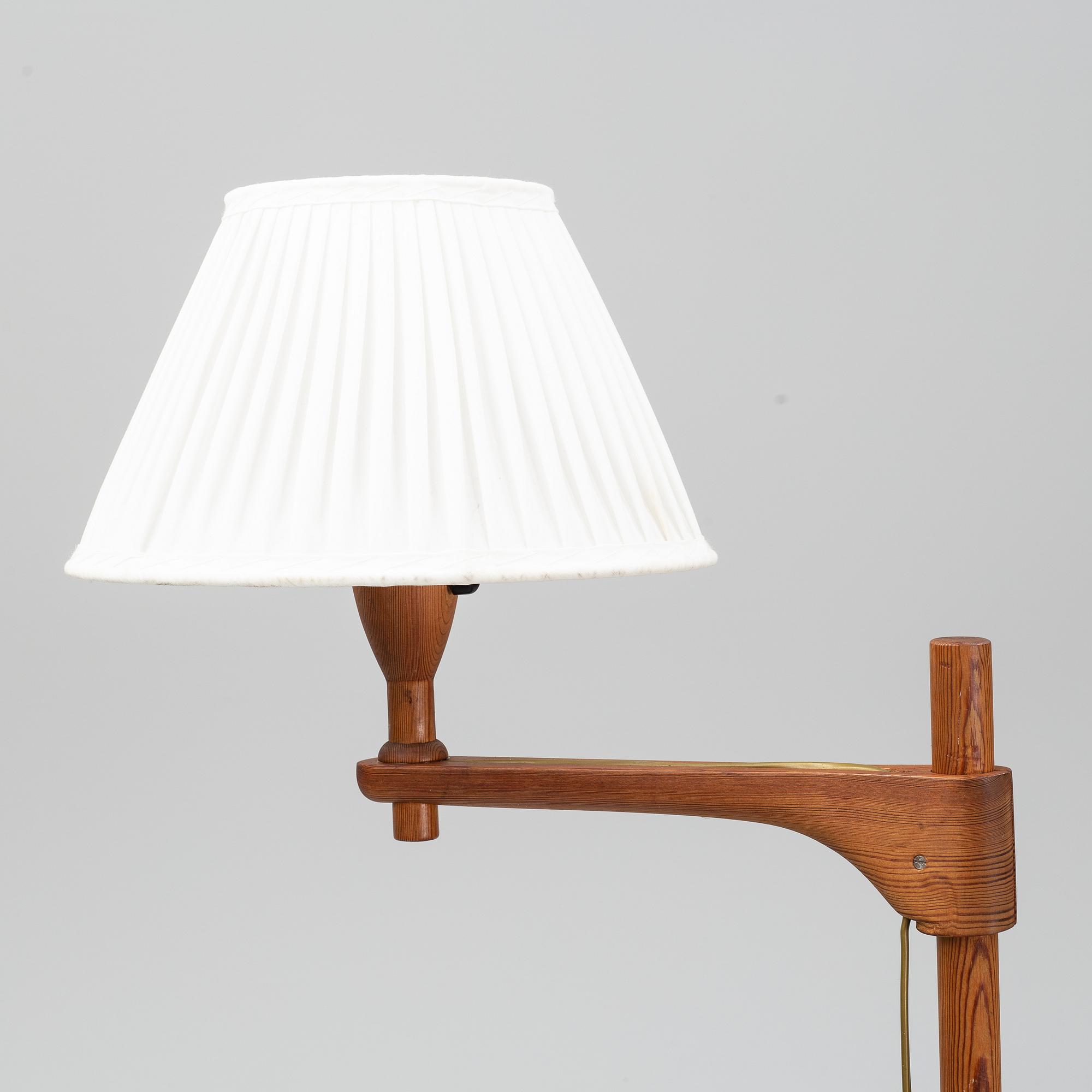 A late 20th century pine wood floor lamp design Carl Malmsten, Sweden.