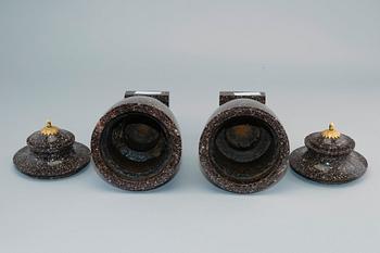 A PAIR OF CAPPED URNS.