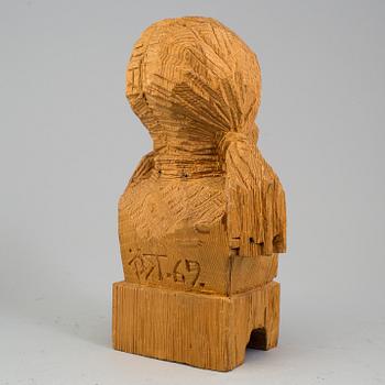 A signed wooden Per Nilsson Öst sculpture dated 69.