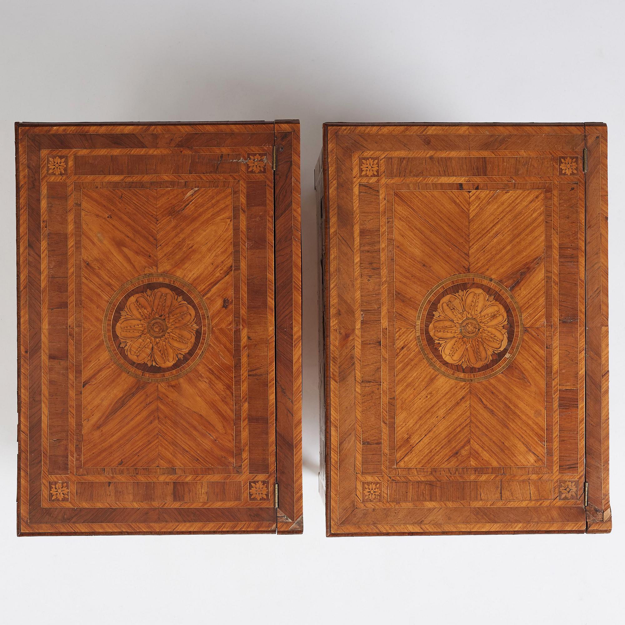 A pair of Italian Louis XVI cabinets, late 18th century.