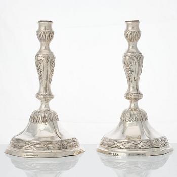 A matched pair of 18th century silver candlesticks, mark of Isak Trybom, Stockholm 1775 and.