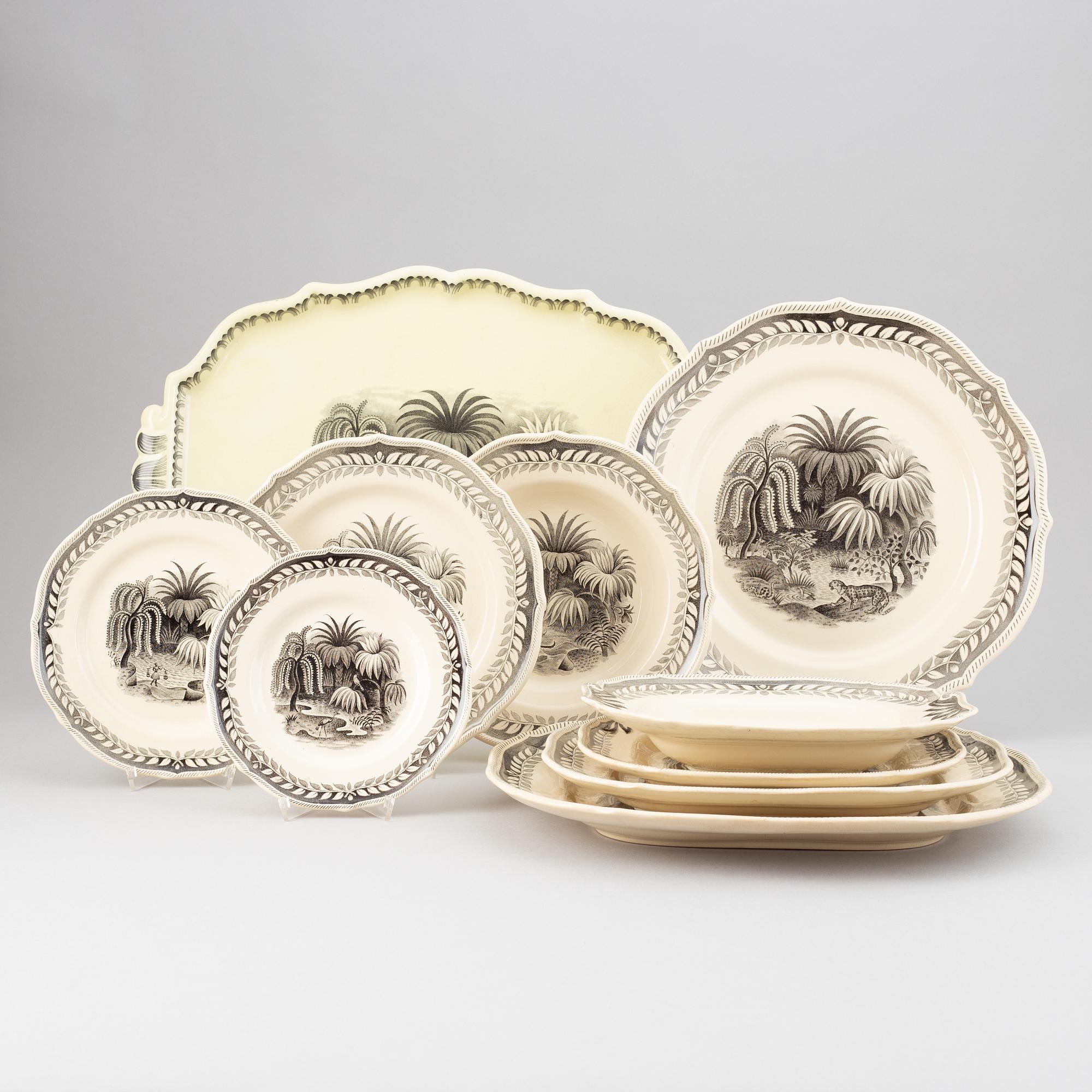 A 67 piece 'Exotica' creamware dinner service by Arthur Percy, Gefle.