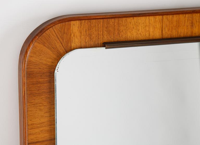 A teak mirror, mid 20th century.