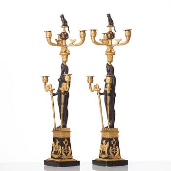 A pair of Russian Retour d'Egypte Empire Alexander I five-light candelabra, St. Petersburg.