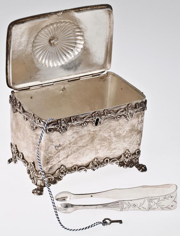 SOCKERSKRIN samt SOCKERTÅNG, silver. Empire. Bl a Zachris Lundqvist, Stockholm 1840.