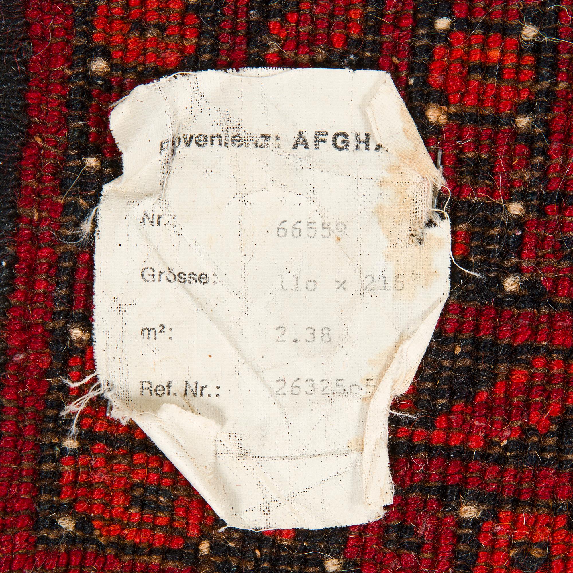 Carpet, Afghan. Approx. 219cm x 106cm.