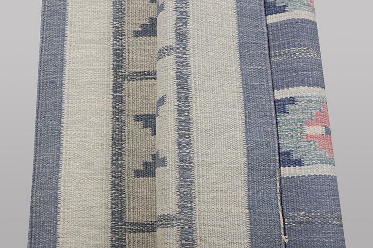 Ingegred Silow, a flat weave carpet, signed IS, ca 197 x 137 cm.
