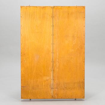 A 1950s three-part dressing mirror.