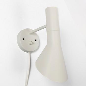 Arne Jacobsen, An 'AJ' wall lamp. Louis Poulsen, 21st century.