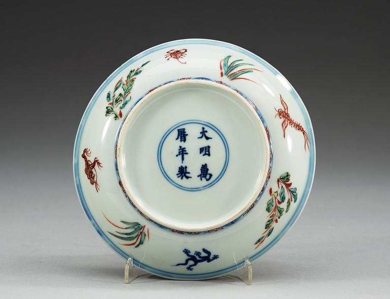 A Wucai dish, Ming dynasty with Wanli's six character mark and period (1573-1613).