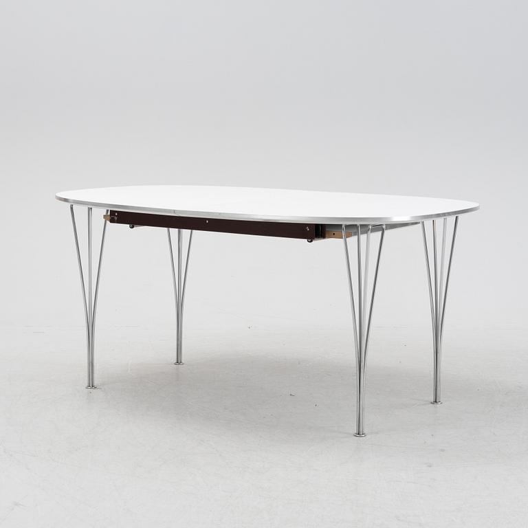 A 'Super elliptical' dining table by Bruno Mathsson & Piet Hein, from around the year 2000.