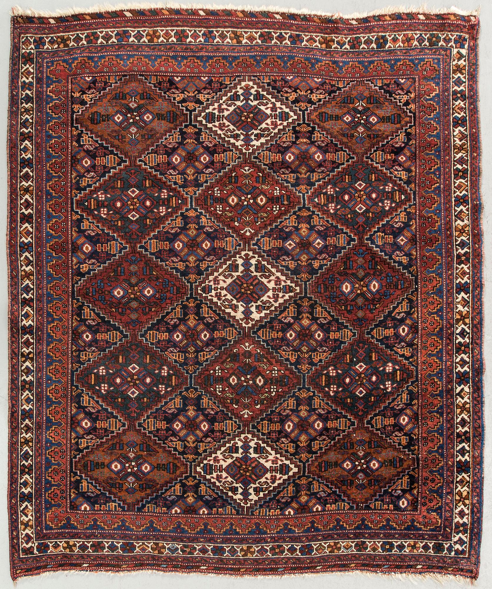 An antique Afshar carpet ca 143 x 129 cm.