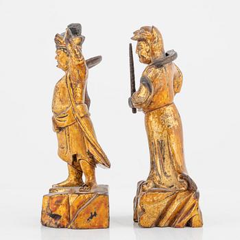 Two wooden figures of guardsmen, Qing dynasty, 19th Century.